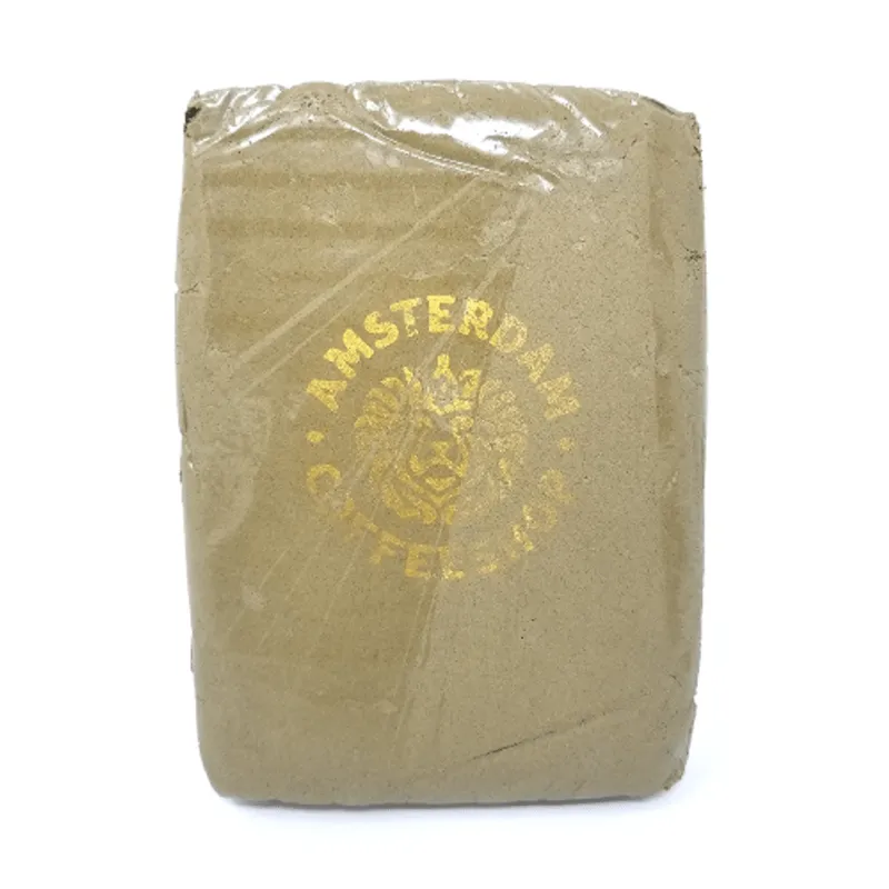 Yellow Amsterdam Coffeeshop hash pouch with two small golden-brown pressed pieces 3
