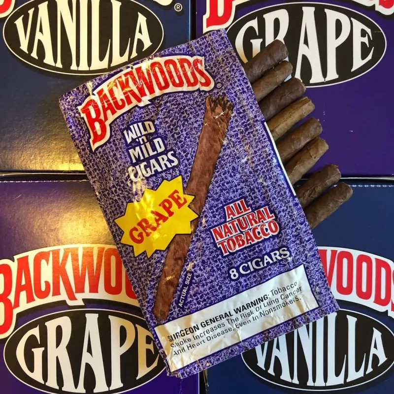 Purple Backwoods Grape box and pouches marked five authentic cigars 2