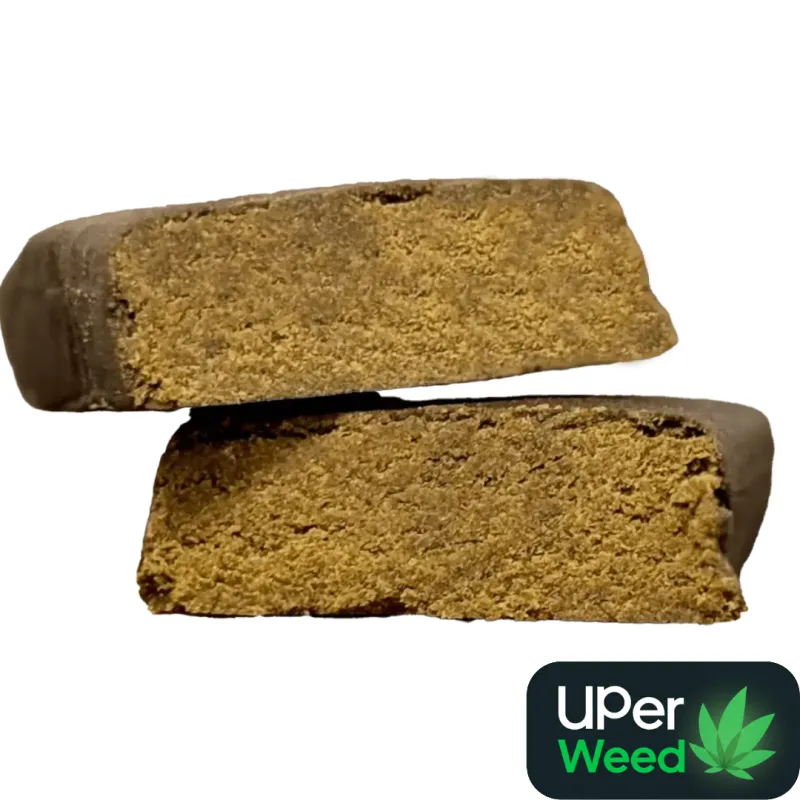 Two light golden-tan Gold Seal Hash blocks with fine porous pressed texture 2