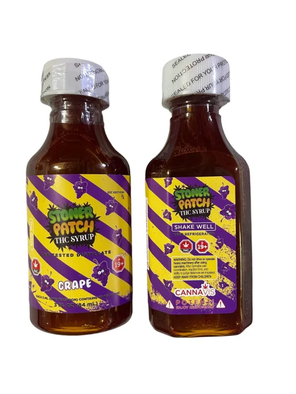 Four amber Stoner Patch THC Syrup bottles with colourful fruit-themed labels 2