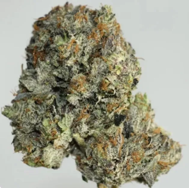 Dense dark-green and purple Pink Morphine Cali Brick flower 2