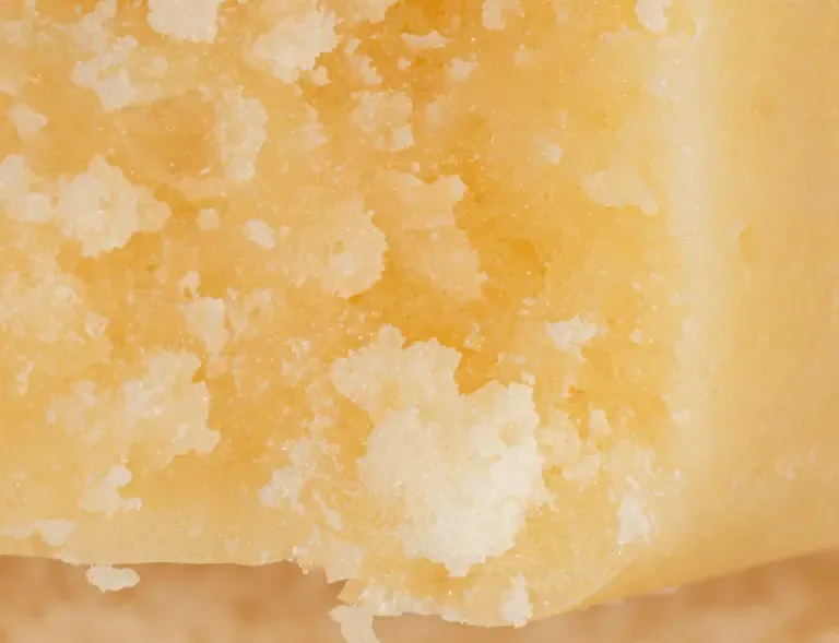 Premium Starburst Hash pale pressed slab with small rounded piece 6